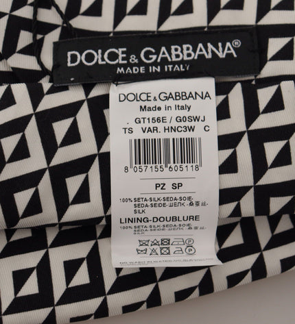 Dolce &amp; Gabbana Elegante cravatta nera in seta per il gentiluomo azzimato